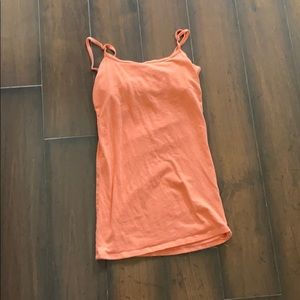 Tank top: orange undershirt
